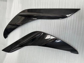 TRD-style carbon fiber door panel trim for Supra A90/A91